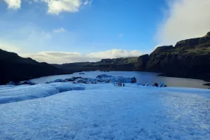 People standing on a glacier.