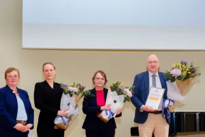 Representatives of the environment and natural resources receive the award.