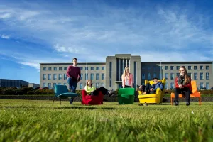 Students in chairs outside of University of Iceland main building